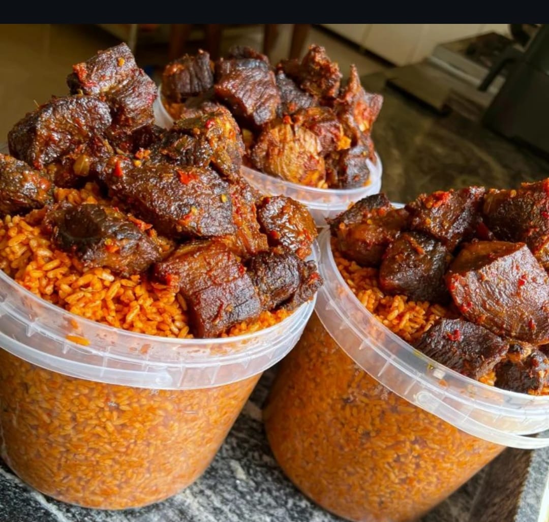 Party jollof rice bowls topped with peppered beef